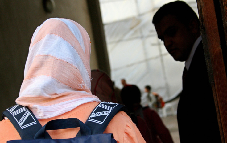 A pupil at Milan school. One Italian headmaster has banned Muslim headscarves, arguing that they constitute a