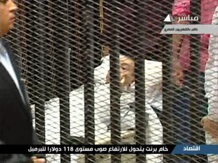 Hosni Mubarak is seen on a hospital bed in the courtroom for his trial at the Police Academy in Cairo in this still image taken from video