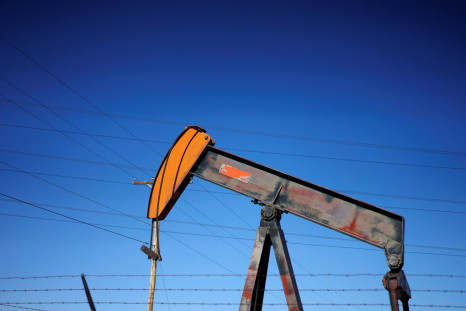 Oil prices drop as falling drilling activity fails to dent US inventory buildup