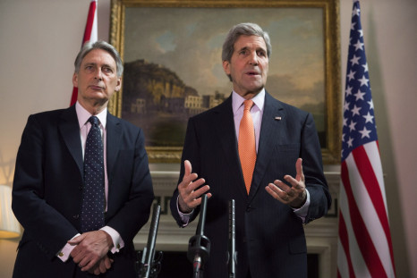 Britain's Foreign Secretary Phillip Hammond and U.S. Secretary of State John Kerry (R) deliver a statement at a press conference in London