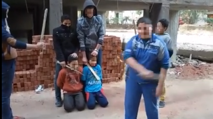 Egyptian children mock Isis beheading