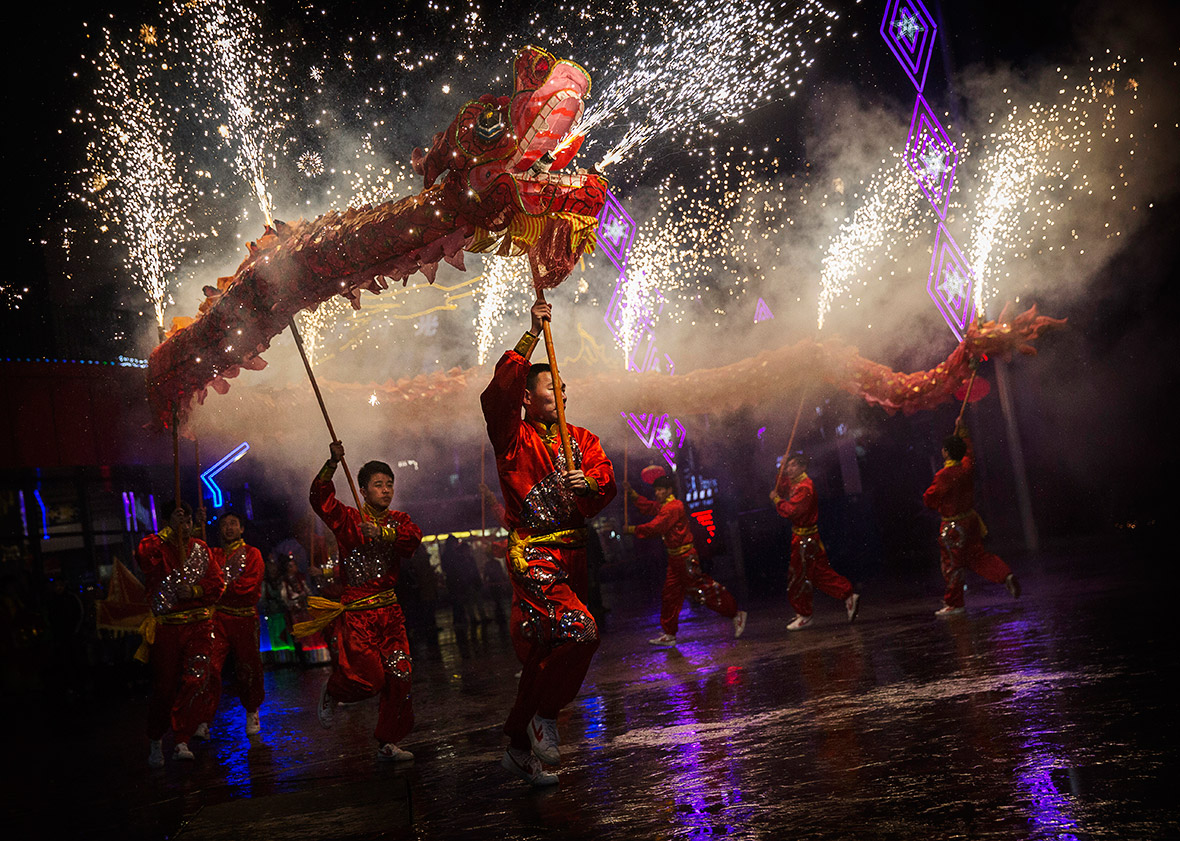 Chinese New Year Fireworks and dragon dances at Spring Festival temple