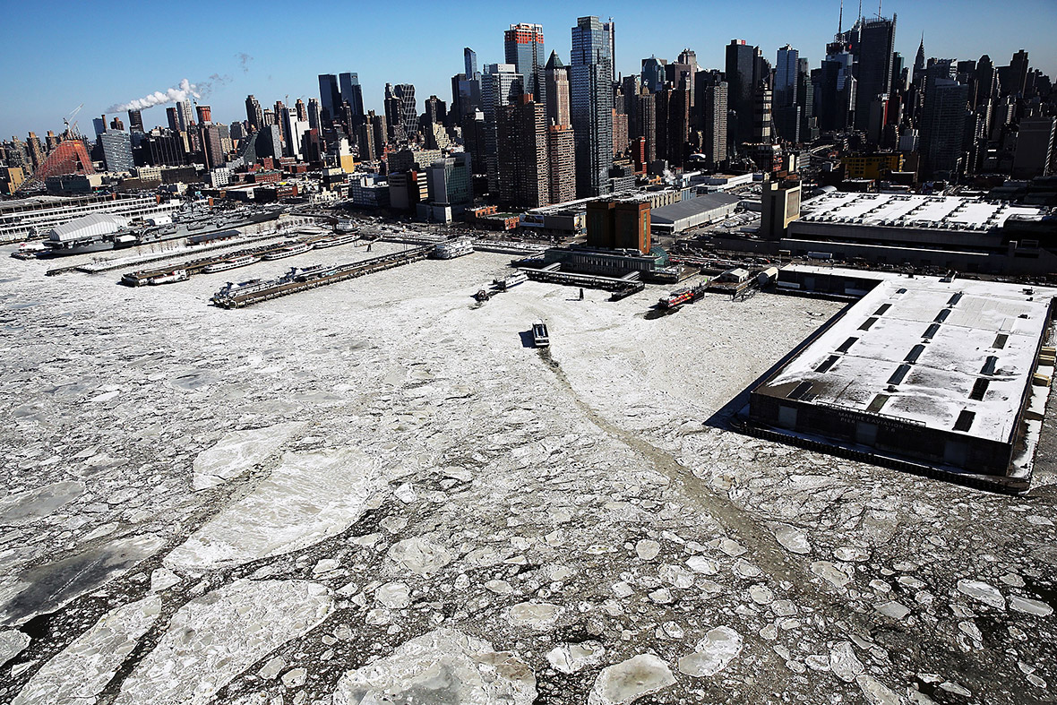 New York Manhattan island surrounded by ice as Hudson and East Rivers