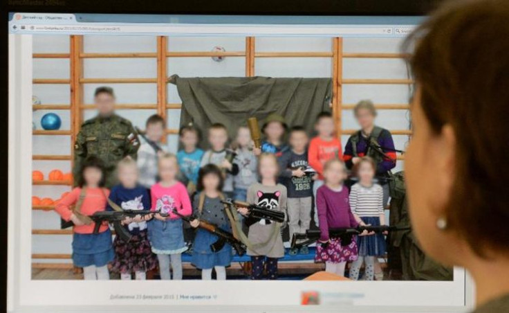 Russian children with Kalashnikovs