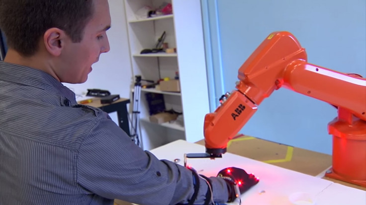 MIT's robot arm working with a researcher