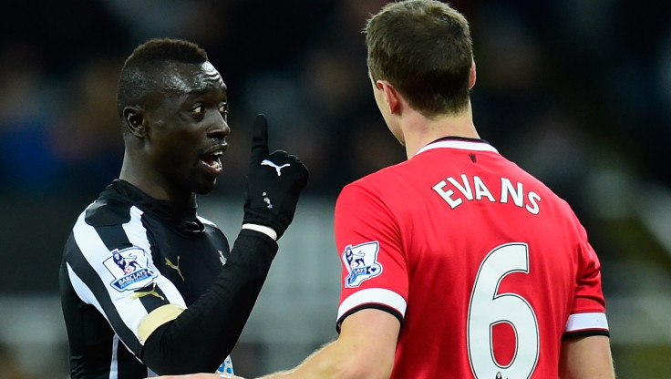 Papiss Cisse and Jonny Evans