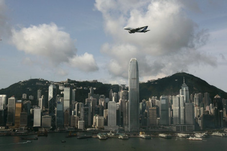 An Airbus A380 flies over Hong Kong's Victoria Harbour in Hong Kong