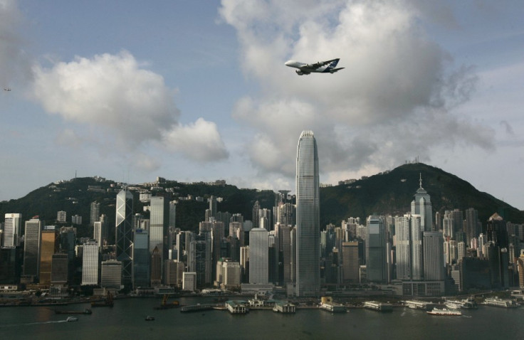 An Airbus A380 flies over Hong Kong's Victoria Harbour in Hong Kong
