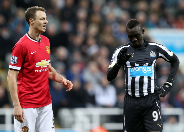 Jonny Evans and Papiss Cisse