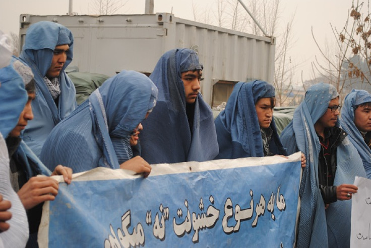 Kabul men burqa protest women violence