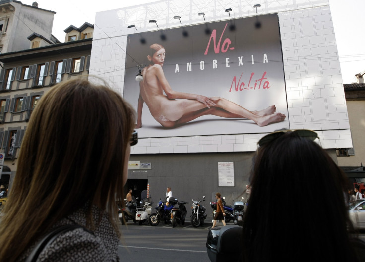 Emaciated woman billboard Milan