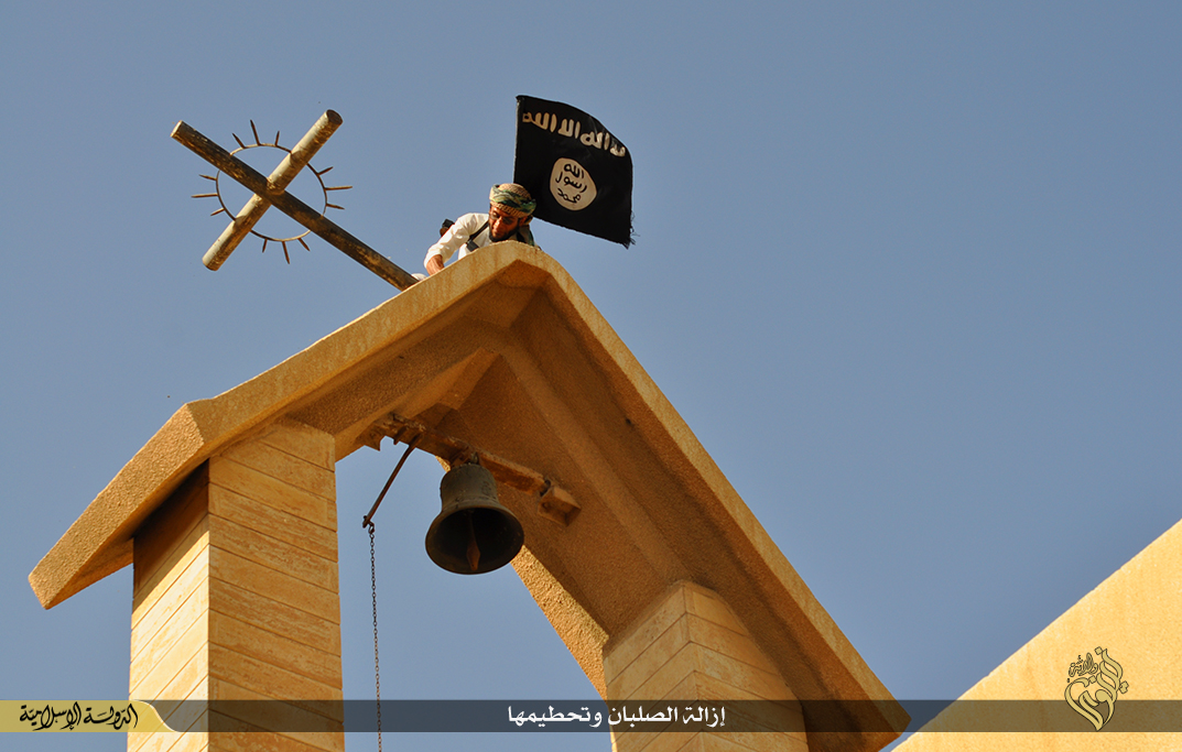 Isis smashing crosses Mosul monastery