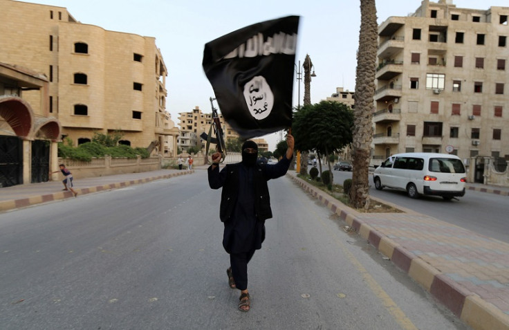 Islamic State Isis fighter with flag