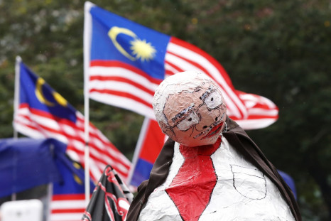 Cartoonist in Malaysia charged with