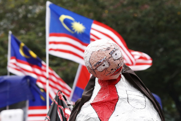 Cartoonist in Malaysia charged with