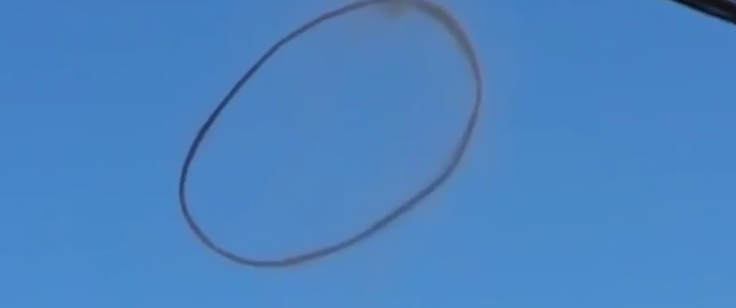 Mysterious black ring caused by UFO? Mysterious black ring caused by UFO?