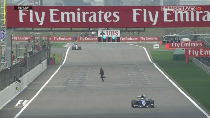 Man invaded China GP track during practice