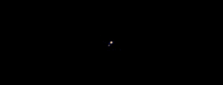 first photo pluto