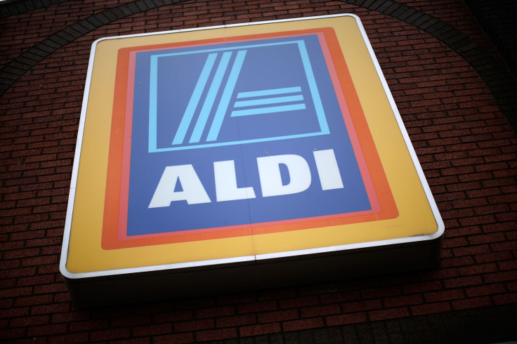 Aldi raiders pointed gun at child