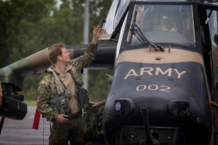 Prince Harry with Tiger helicopter