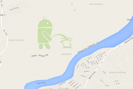 Android robot urinating on Apple logo