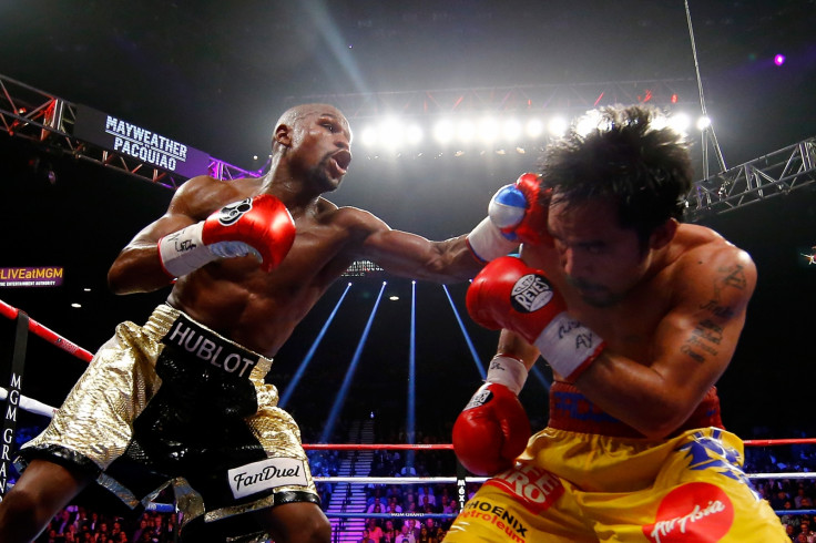 Floyd Mayweather defeats Manny Pacquiao