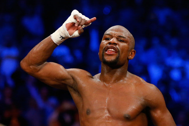 Floyd Mayweather defeats Manny Pacquiao Floyd Mayweather defeats Manny Pacquiao