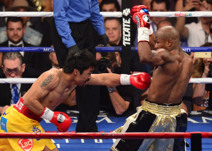 Floyd Mayweather defeats Manny Pacquiao Floyd Mayweather defeats Manny Pacquiao