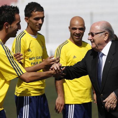 Sepp Blatter and Palestinian footballers