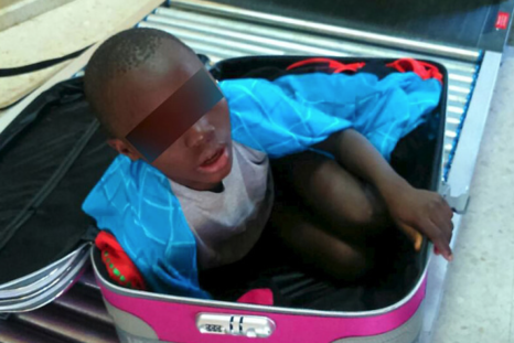 Eight-year-old smuggled in suitcase