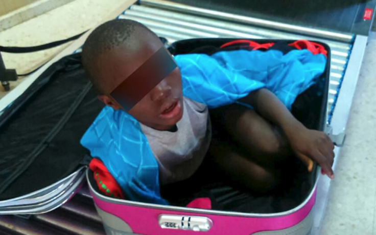 Eight-year-old smuggled in suitcase