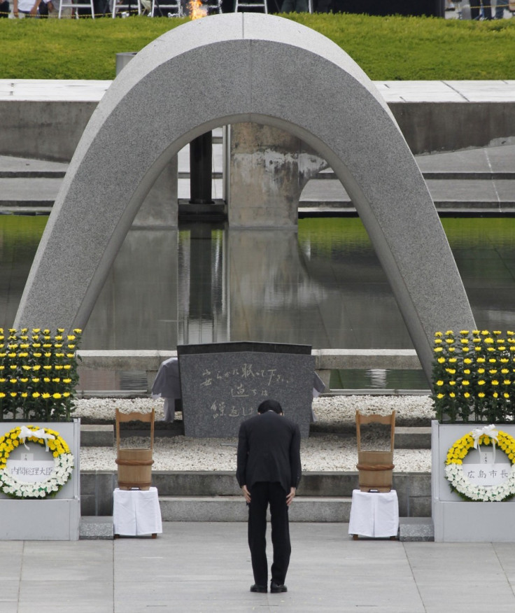 Japan&#039;s Prime Minister Naoto Kan bows