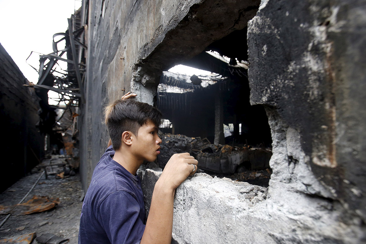 Philippines footwear factory fire Bars on windows trapped workers on