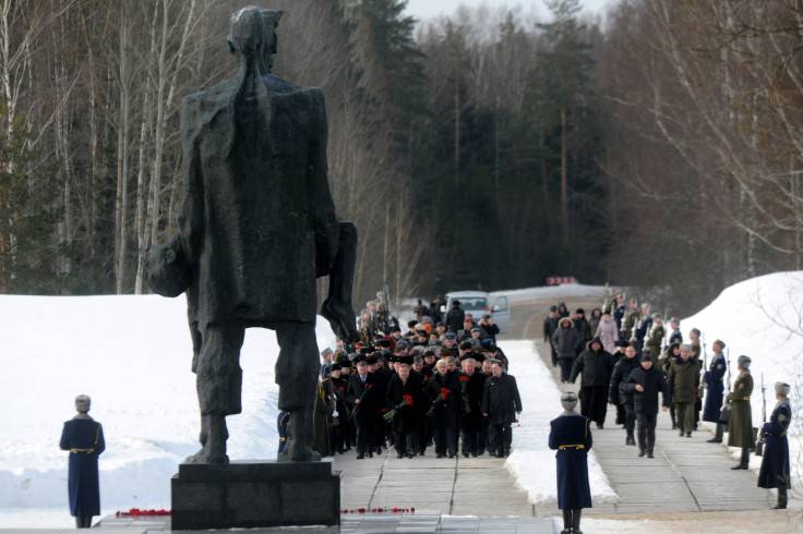 Belarus officials and people lay