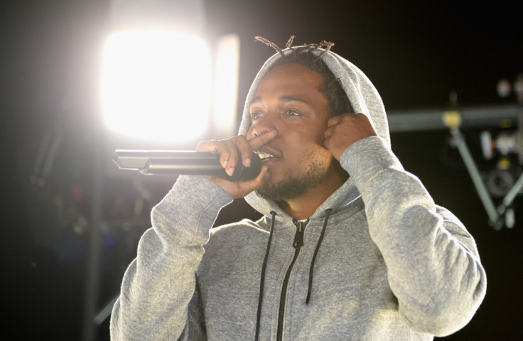 Kendrick Lamar kicks fan off stage