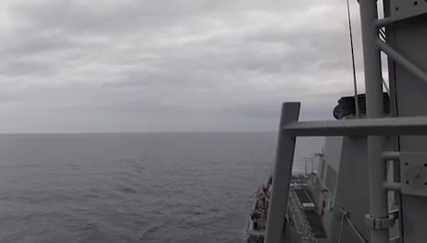 Russian jet close pass on US navy ship in Black Sea caught on camera ...