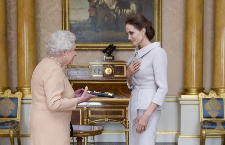 Angelina Jolie receiving a damehood in 2014