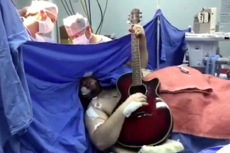 Brazilian guitarist plays during operation