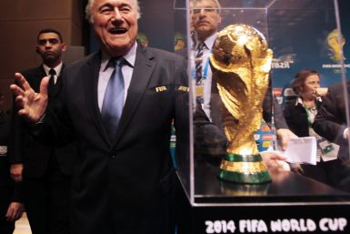 Sepp Blatter and the World Cup trophy