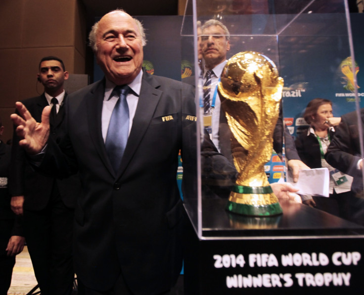 Sepp Blatter and the World Cup trophy