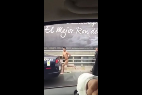 Mexican police chase naked man