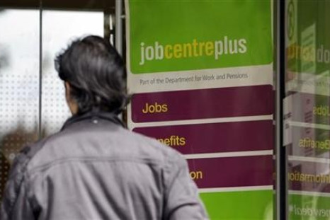 A man enters a job centre in London. File photo.