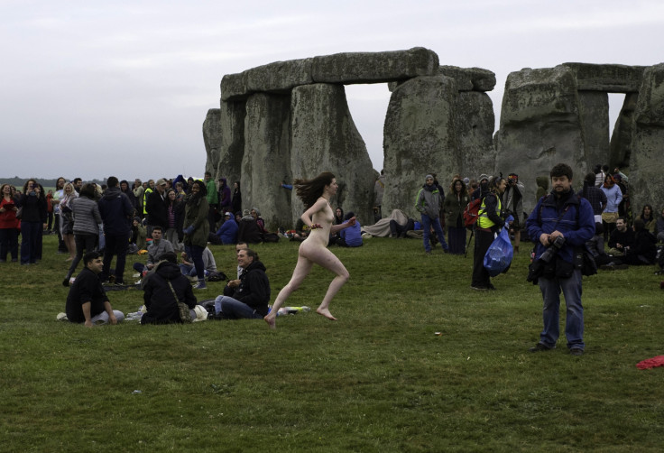 A naked reveller at Stonehenge