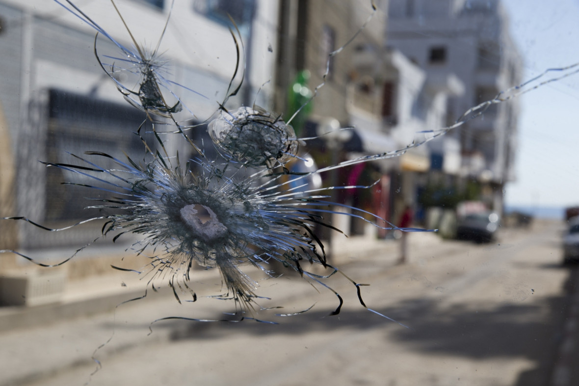 A bullet-riddled windscreen A bullet-riddled windscreen