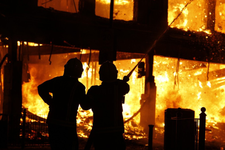 Firefighters putting out the fire