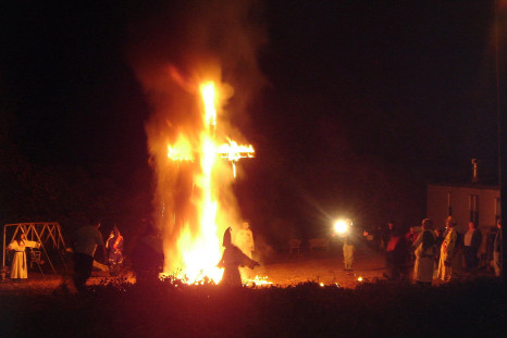 KKK burning crosses