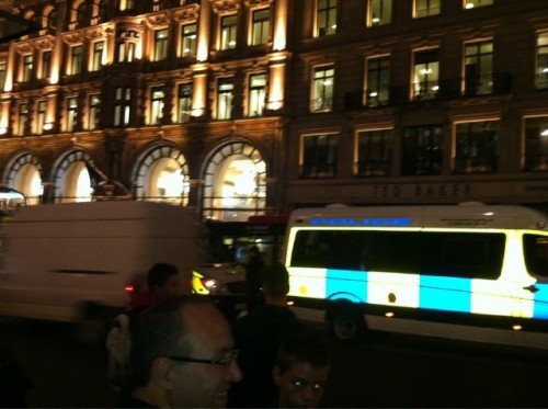 Police Protect Apple Store While Sony Warehouse Burns