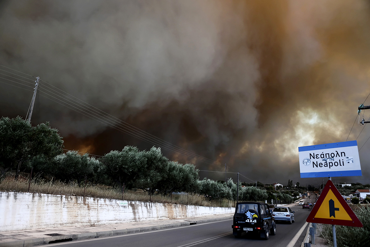 Greece Fire rages on the hills around Athens causing residents to flee