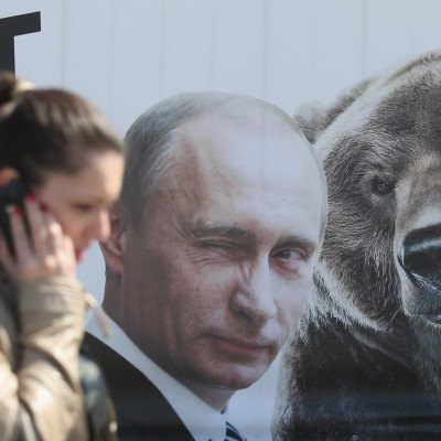 Vladimir Putin and a bear