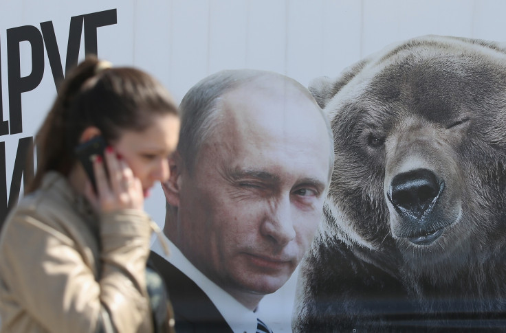 Vladimir Putin and a bear